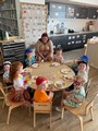 children sitting around table